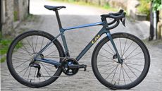 The 2024 Liv Langma in full on a cobbled road