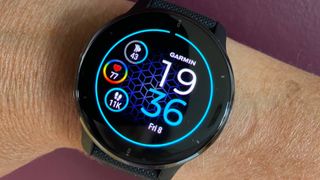 Female cyclist wearing the Garmin Venu 2 Plus which is one of the best smartwatches for cycling